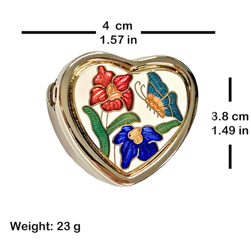 small heart-shaped enamel pill box